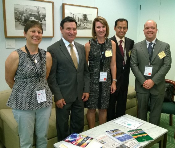 Dr Lisa Akison (centre) with Tony Zappia (MP) and other delegates at Parliament House.