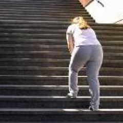 Woman walking up stairs